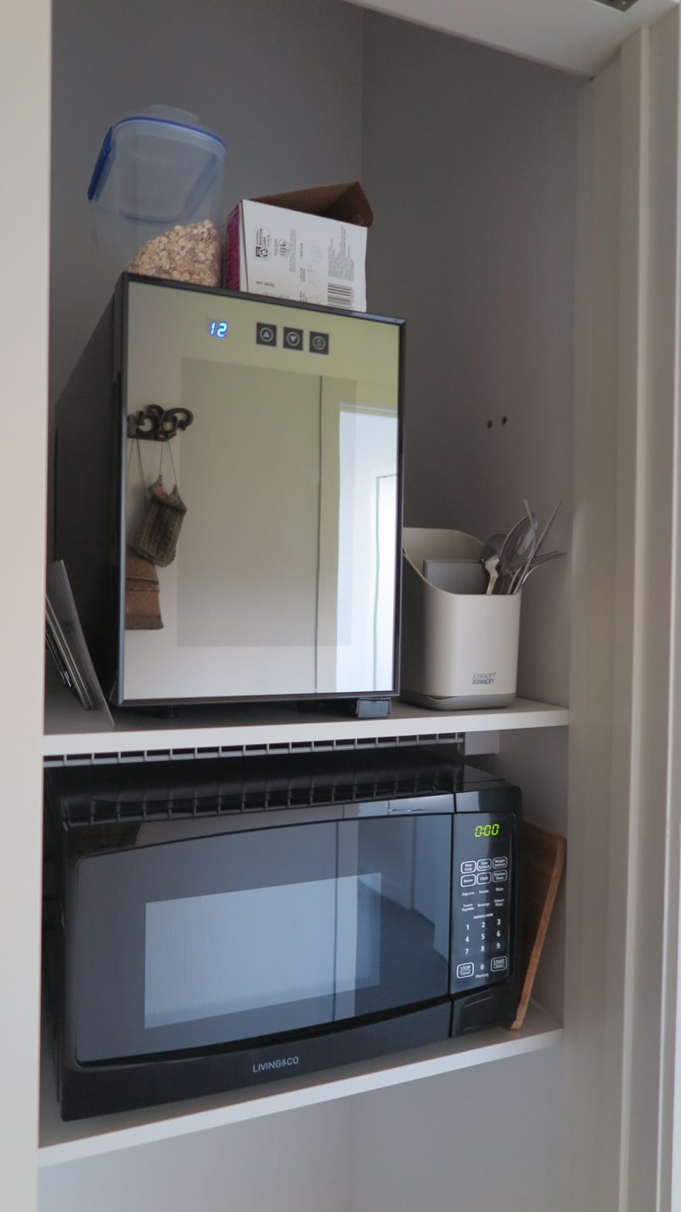 Kitchenette area with fridge and microwave