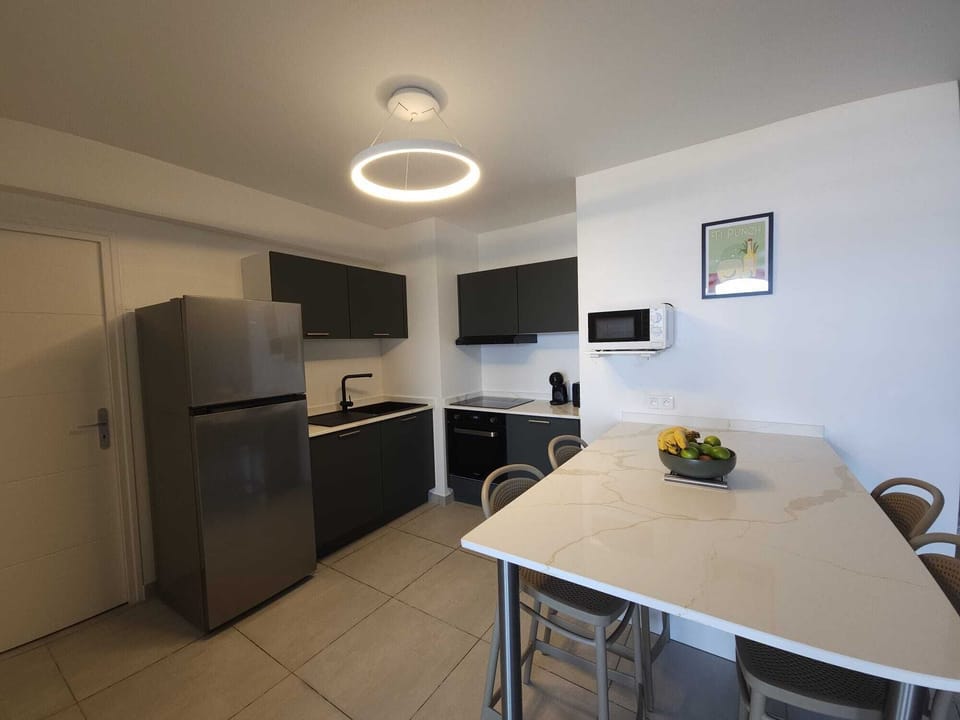Comfort Apartment | Private kitchen | Full-size fridge, microwave, stovetop, highchair