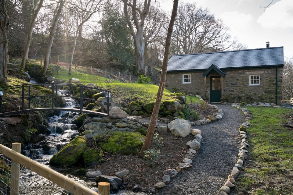A delightful stream runs through the garden with a little bridge