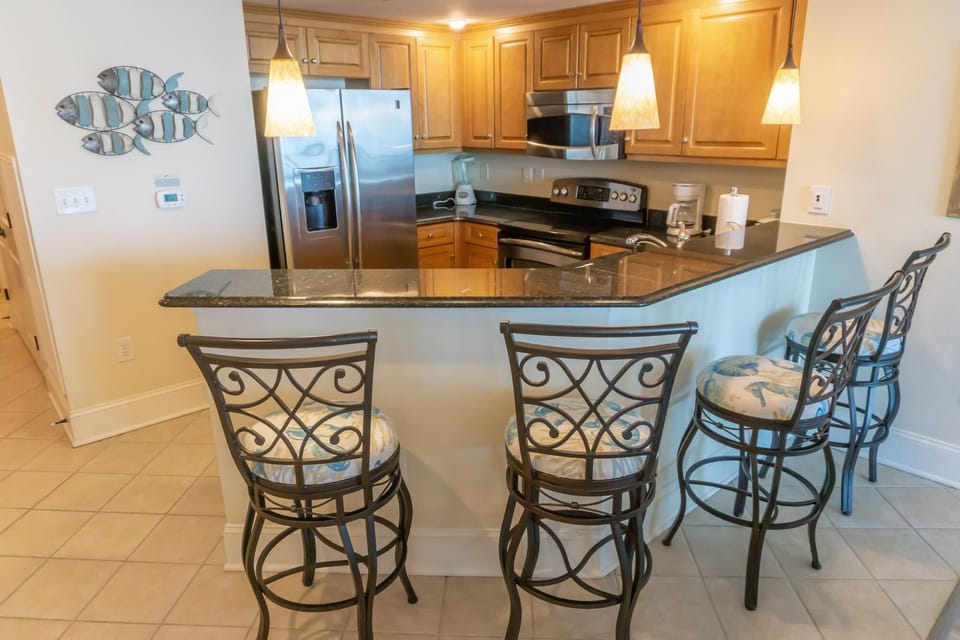 Spacious kitchen with breakfast bar and stylish seating