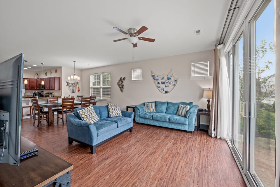 This comfy living room offers space for everyone to gather!