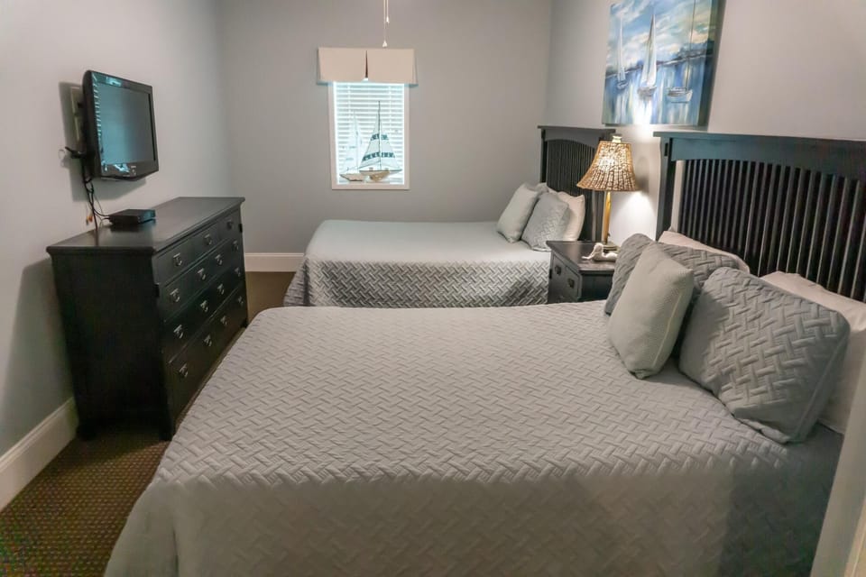 Cozy bedroom retreat with modern comforts and natural light