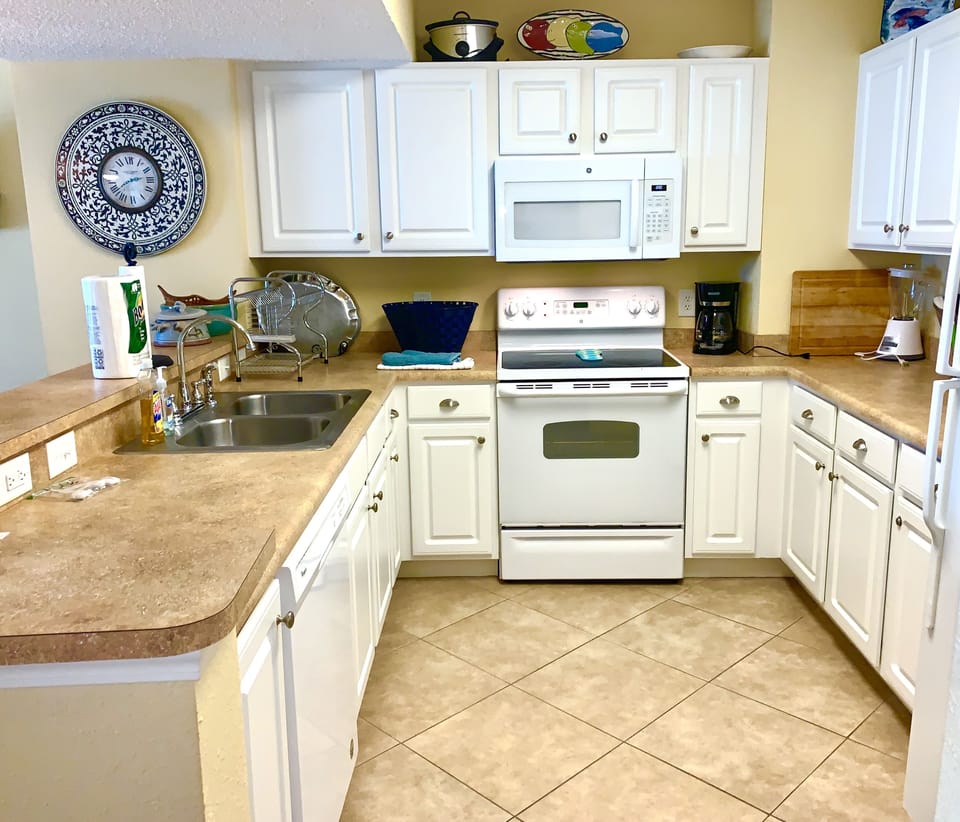 Tiled Kitchen with Dishwasher, flat top stove and Oven, Microwave