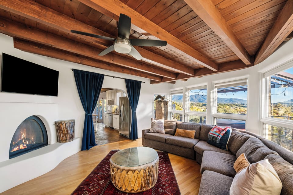 Cozy sunroom with gas kiva. 
