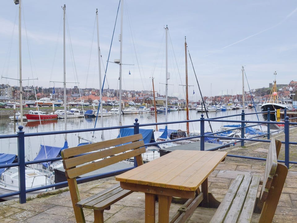 Lovely view over the harbour from the patio | Moon River Cottage, Whitby