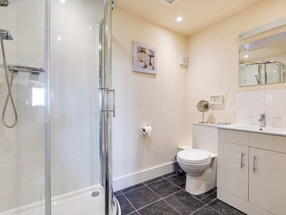 The bed and ensuite in The Dairy | The Dairy - Springfield Barns, Myddle, near Shrewsbury