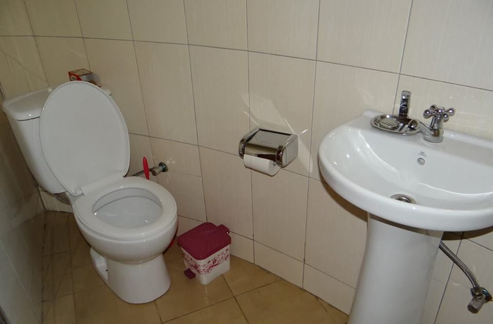 Shower, free toiletries, slippers, towels