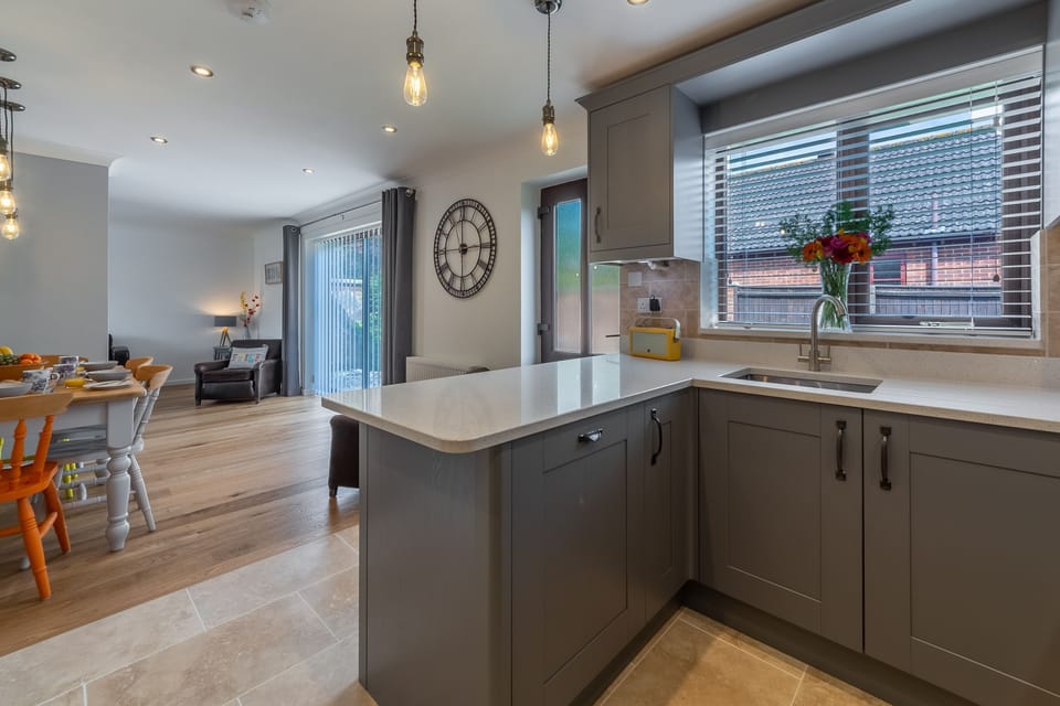 Ground floor: Kitchen looking through to dining and sitting areas