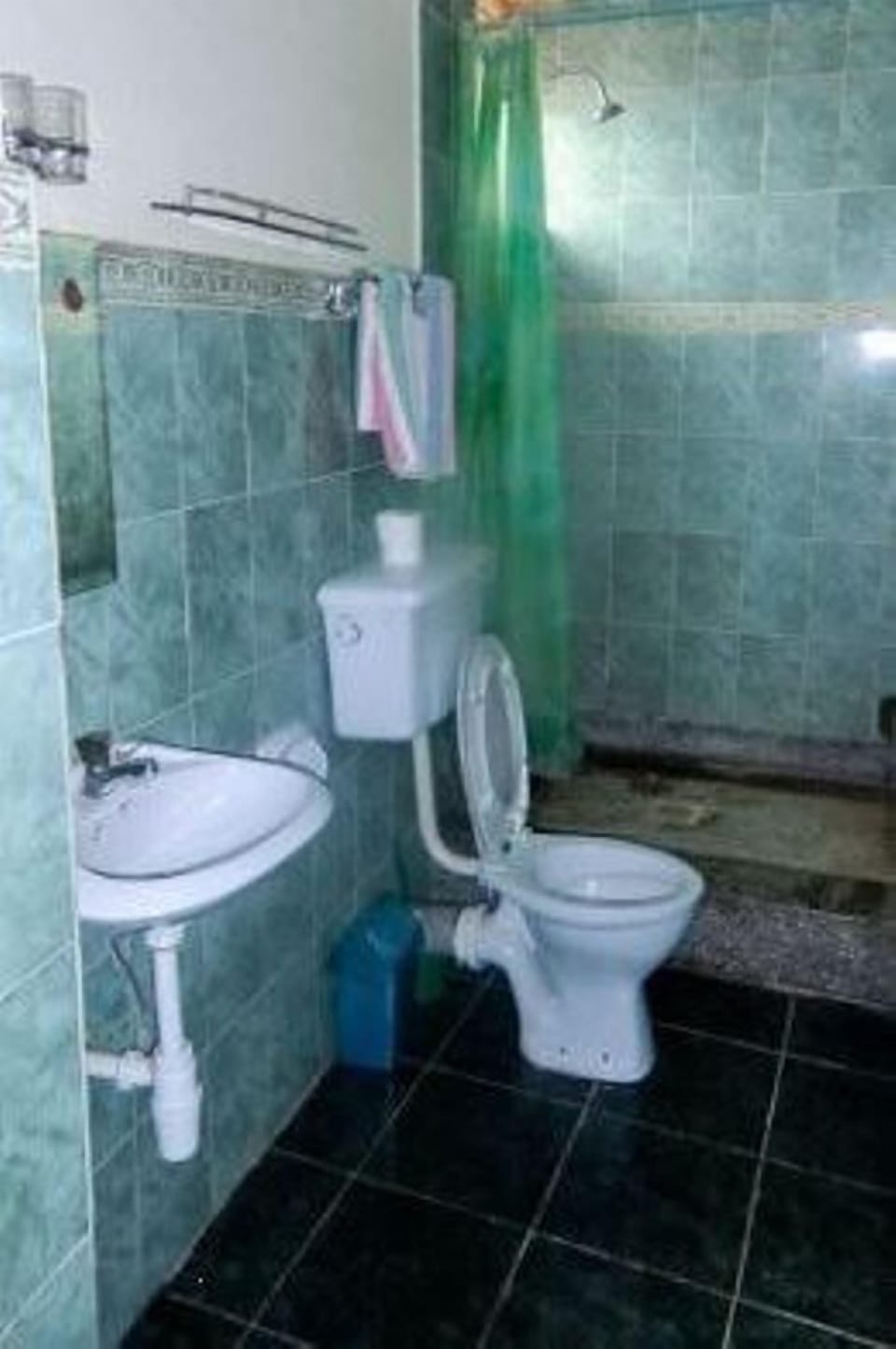 Shower, slippers, towels, soap