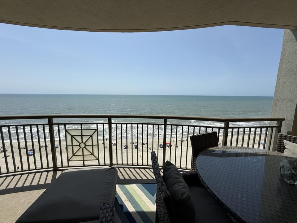Oceanfront balcony with stunning beach and water views