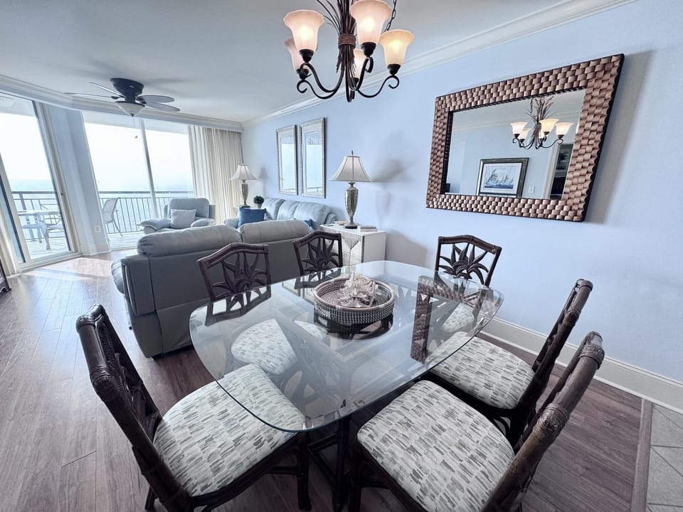 Sunlit dining area with ocean views and cozy living space