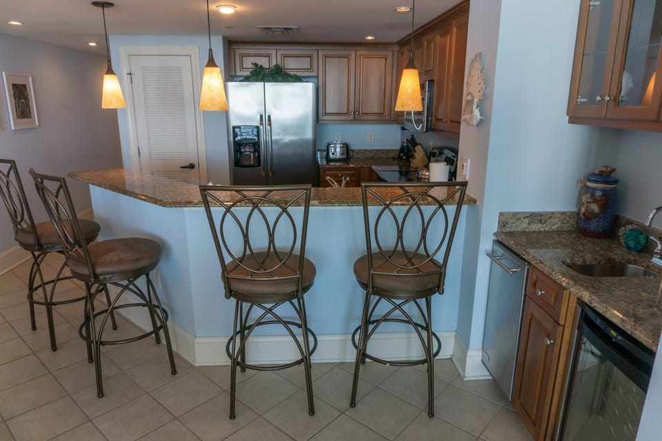 Cozy kitchen with breakfast bar and stylish seating