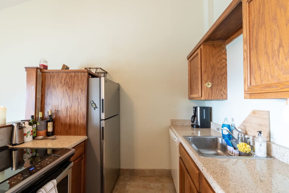 fully stocked kitchen and new appliances.