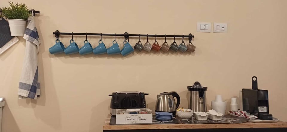 Shared fridge, microwave, stovetop, coffee/tea maker
