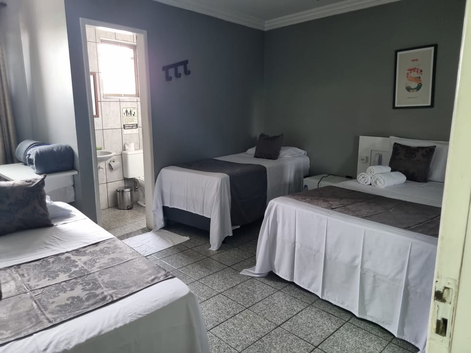 Triple Room, Multiple Beds | Desk, iron/ironing board, free WiFi, bed sheets