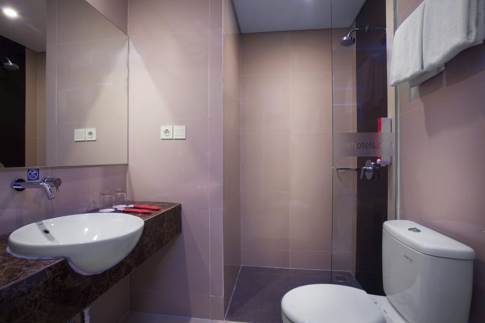 Shower, free toiletries, hair dryer, slippers