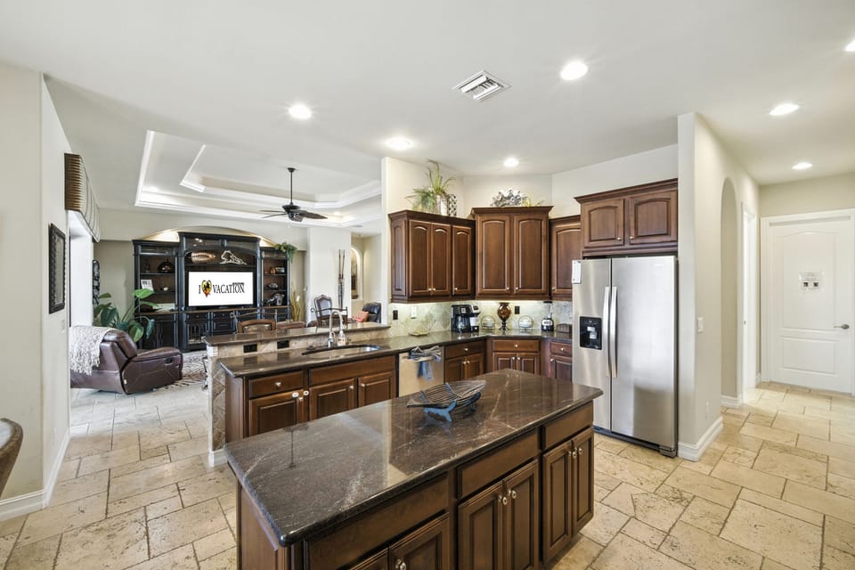 There is an island for extra space & room for 2 at the breakfast bar