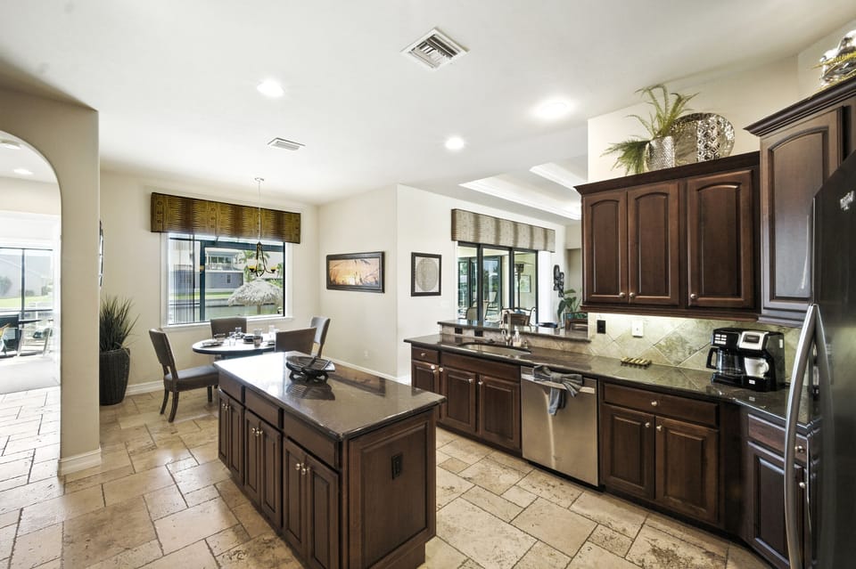 The kitchen has stainless steel appliances
