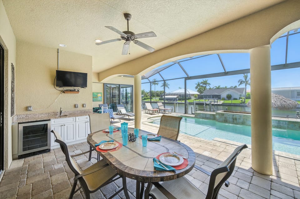 There is outside dining for 4 & a flat-screen TV