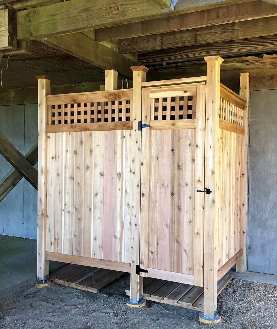 Brand new cedar outdoor shower with hot and cold water rainhead shower