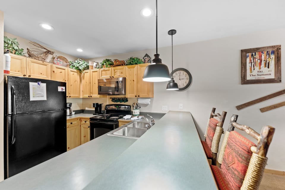 Your fully equipped kitchen awaits with modern appliances and ample counter space for preparing memorable meals together.