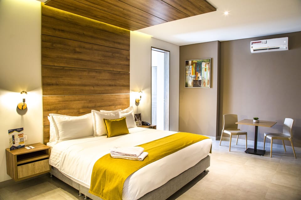 Deluxe Suite | Premium bedding, minibar, in-room safe, individually decorated