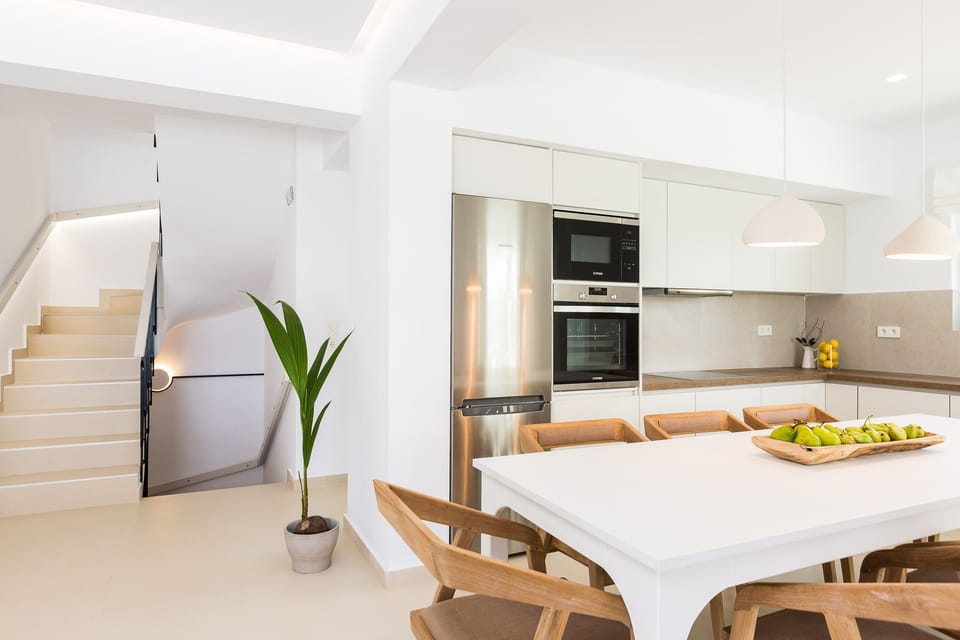 The living room area has direct access to a fully equipped kitchen!