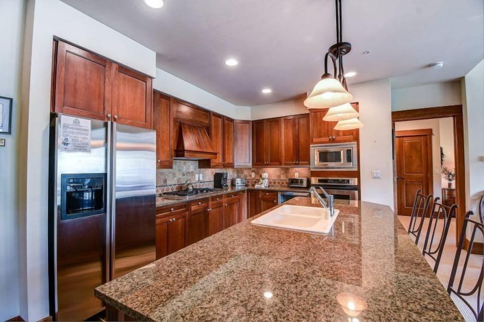 Condo (300-4_Lone_Eagle) | Private kitchen | Fridge, toaster, cookware/dishes/utensils, dining tables