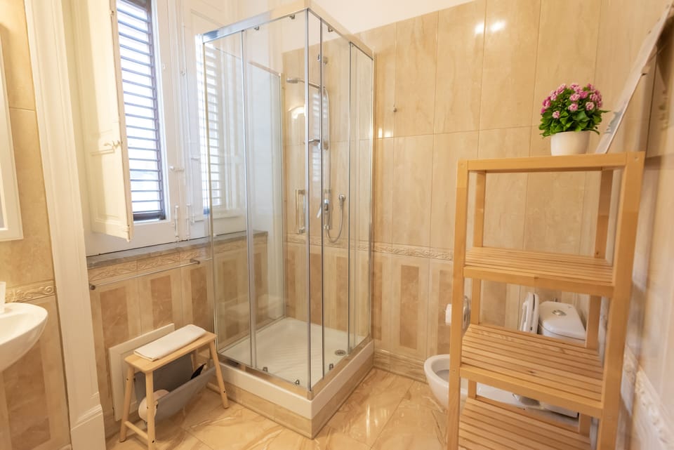 Deluxe Room, City View (La Cattedrale) | Bathroom | Shower, rainfall showerhead, free toiletries, hair dryer