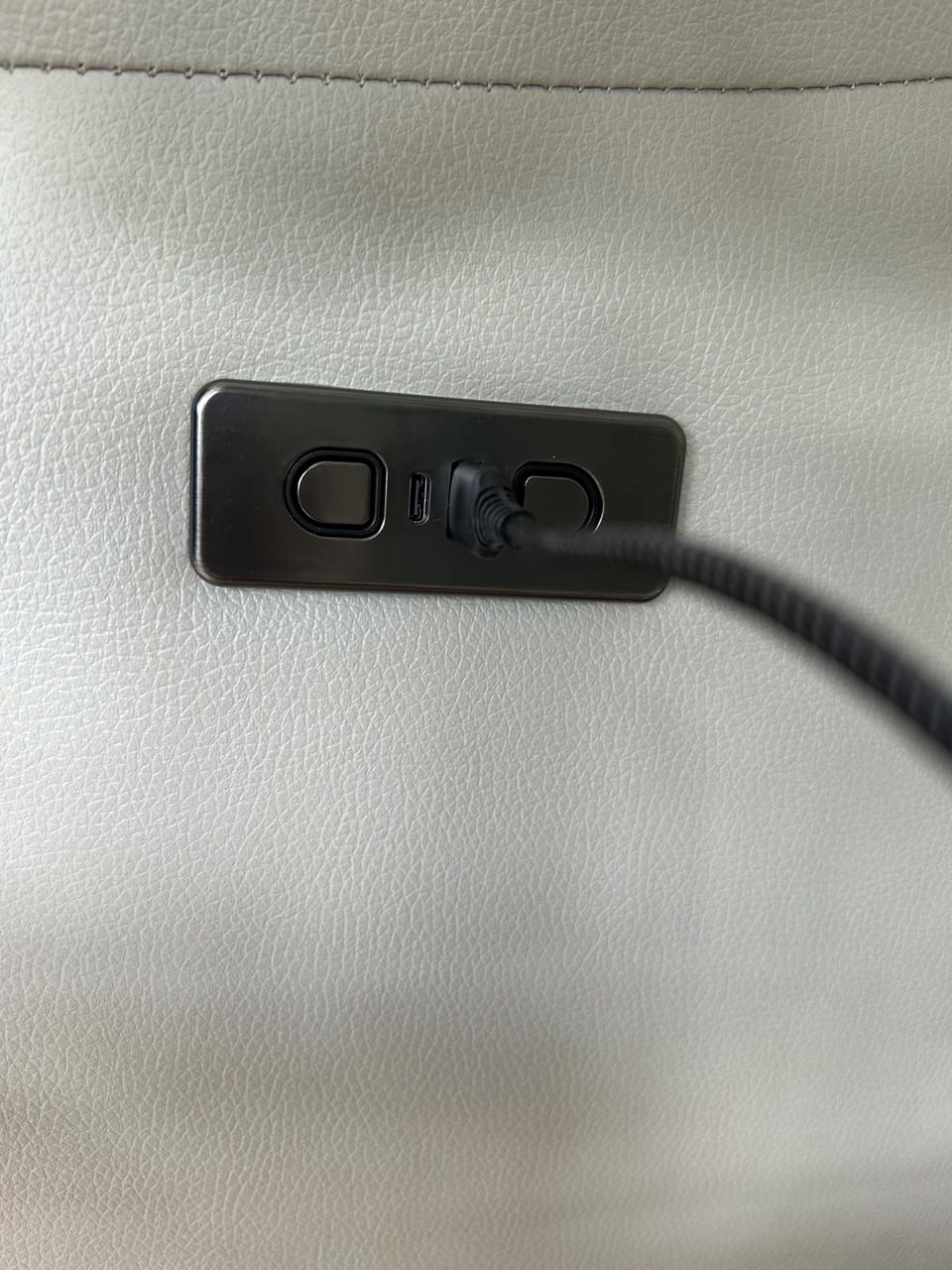 Power recliners with USB and USB-C connections on both sides of the couch.