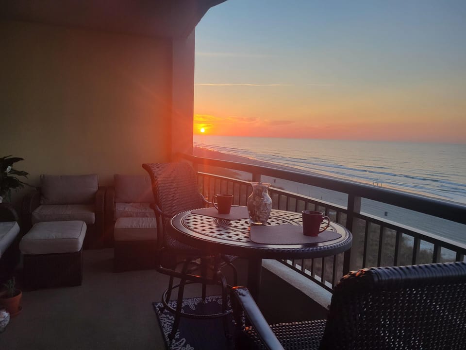 Enjoy the sunrise with your morning coffee at the high-top seating