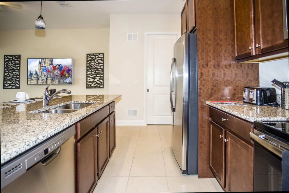 Kitchen: Fully equipped modern kitchen, perfect for whipping up family favorites.