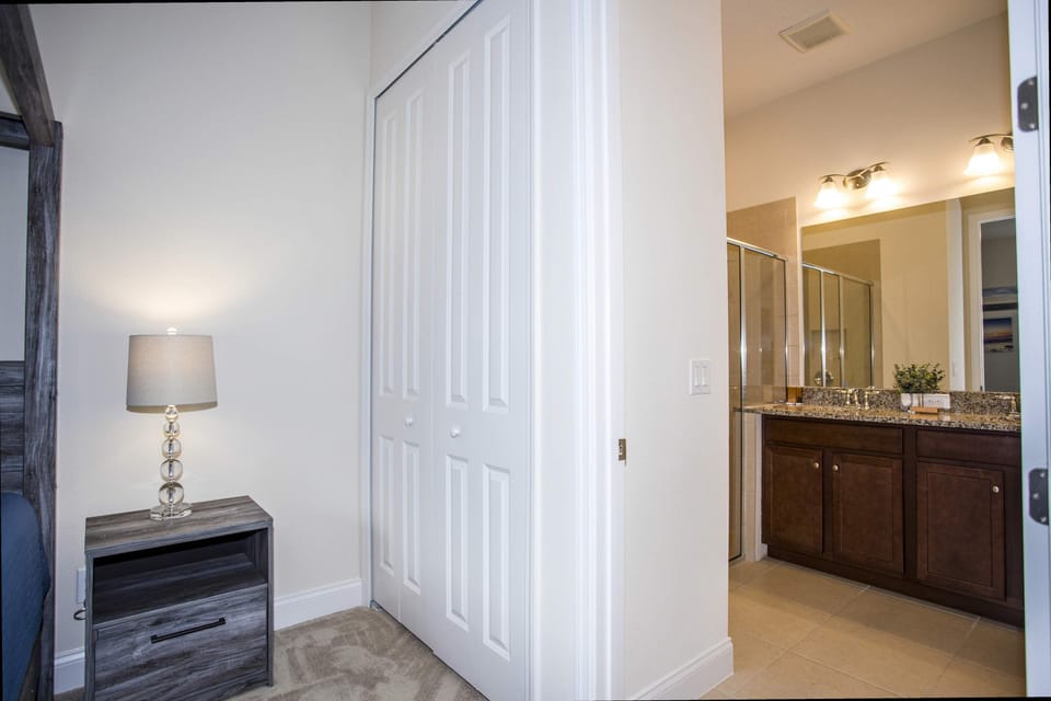 Modern and spacious master bathroom, with walk-in shower, and double sinks for ultimate convenience.