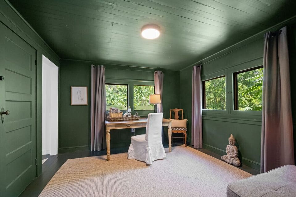 Tucked at the back of the home, this flexible space offers a calming setup for remote work, reading, or sneaking away for a little "me time" in between adventures.