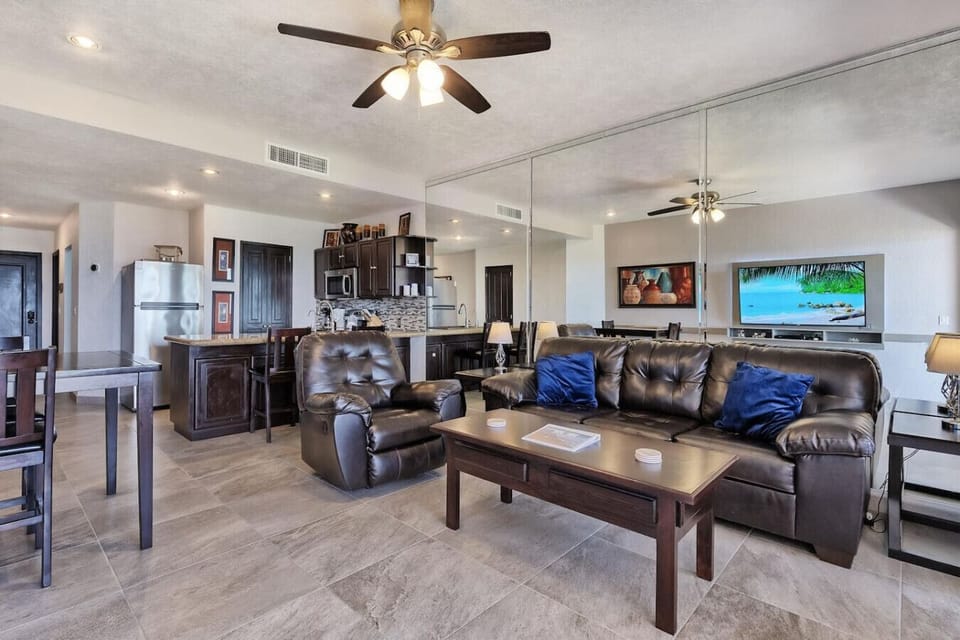 Living room with 65` TV with streaming capability