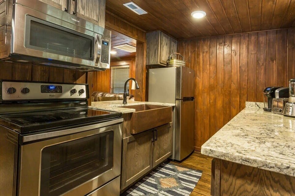 Top of the line kitchen with stainless appliances and copper farmhouse sink!
