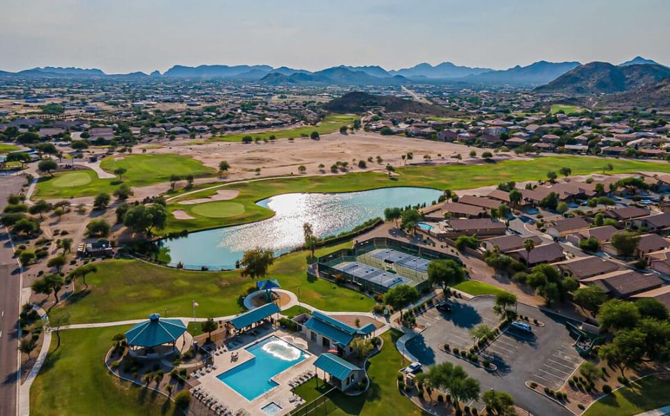 View of our community pool, pickleball and tennis courts and golf course.