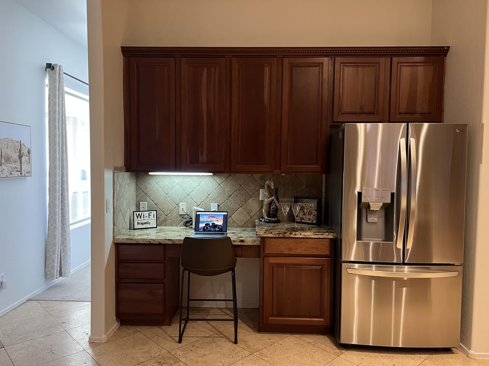 Spacious kitchen with desk area. Walk in panty, all new appliances.