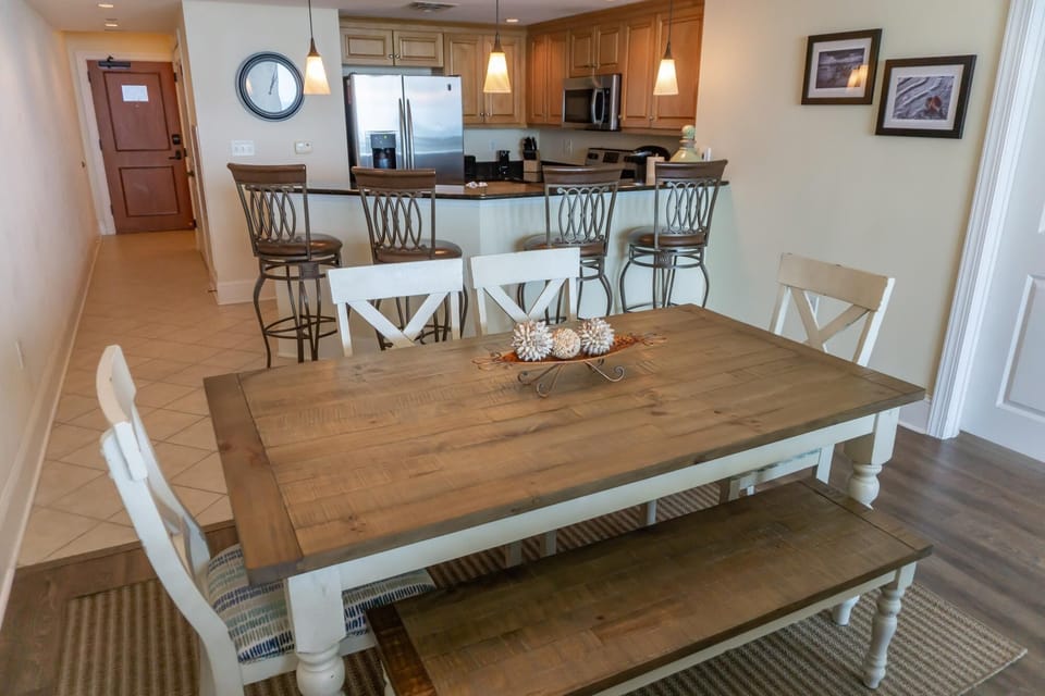 Cozy dining area with rustic charm and open kitchen view