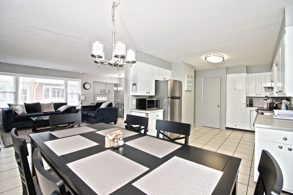 open kitchen that seats 6, flows into living room area