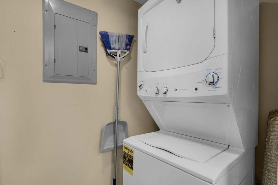 Stack washer and dryer in unit