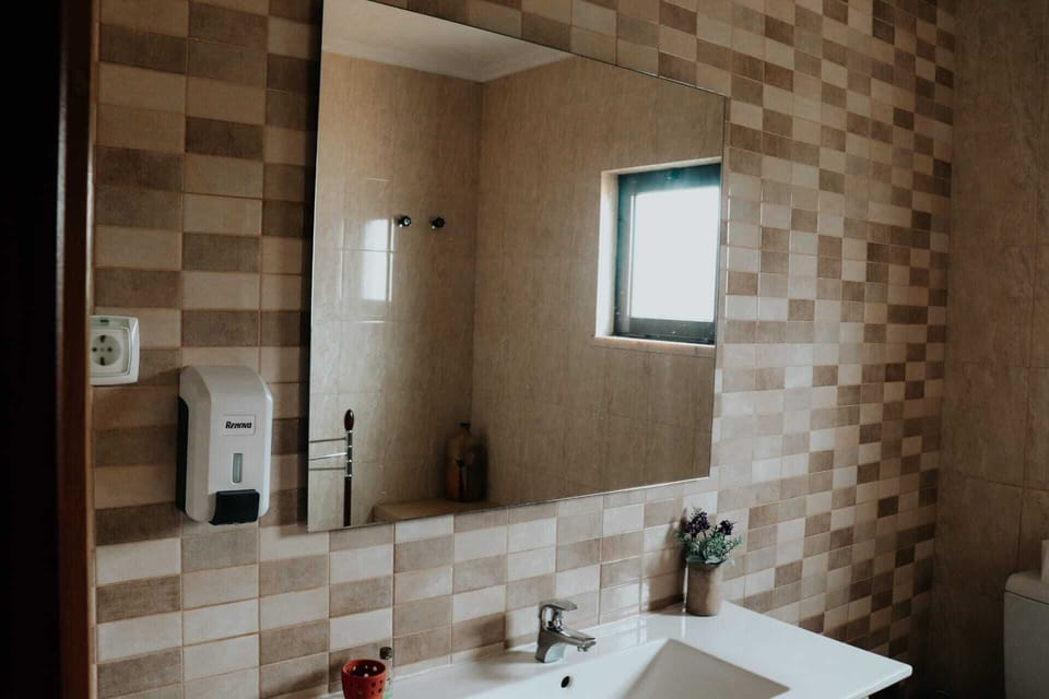 Shower, towels, soap, toilet paper