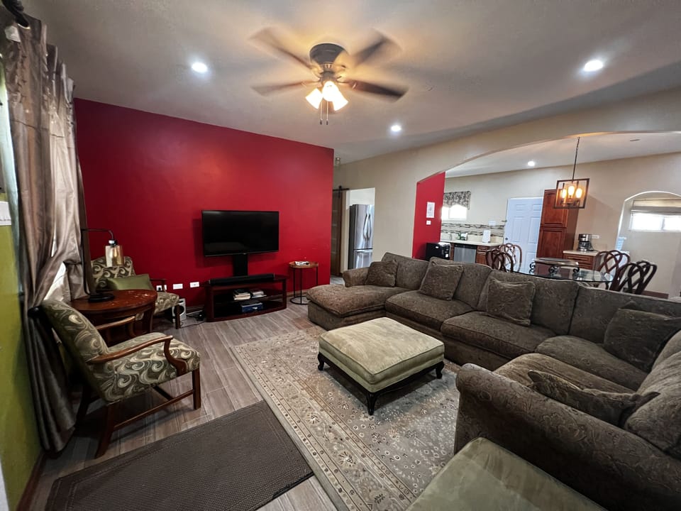 Open concept living, dining, and kitchen area
