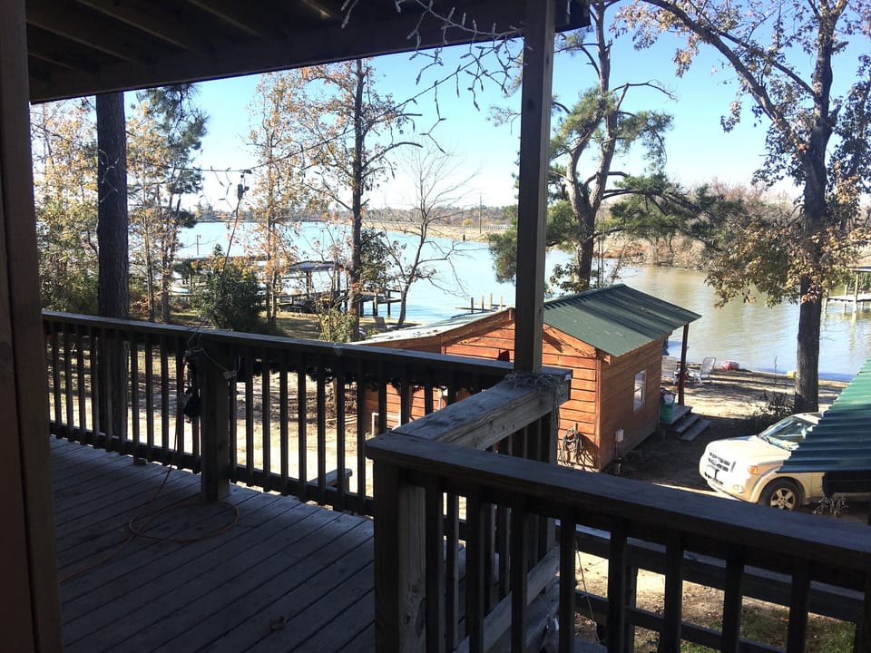Large covered balcony, waterview w/short stairs to the waterfront.  Sleeps 7