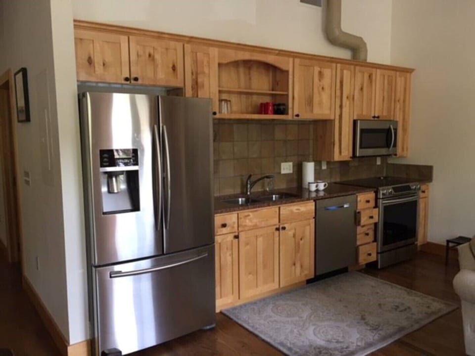 Open Kitchen with top of the line appliances.
