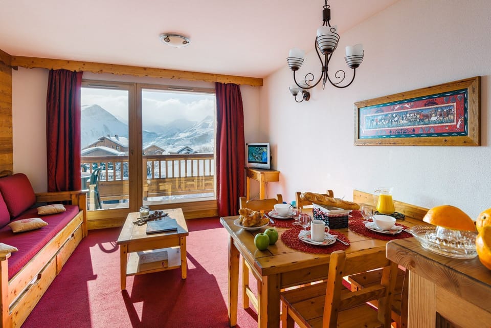 Enjoy your meal at the dining table with seating for 4.