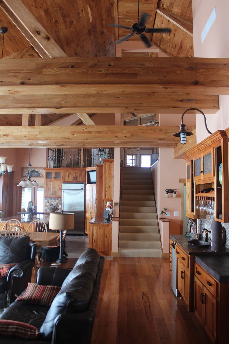 View from the family room towards the kitchen and stairs to the loft.