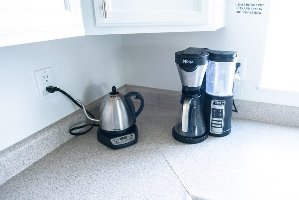 Coffee and hot water tea kettle included.