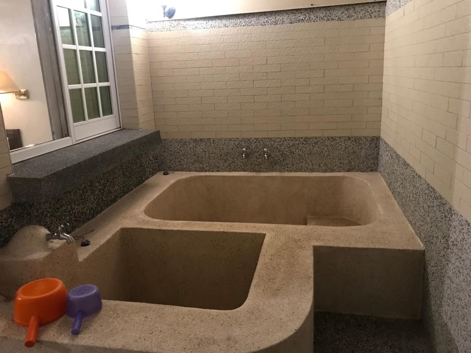 Shower, free toiletries, hair dryer, slippers