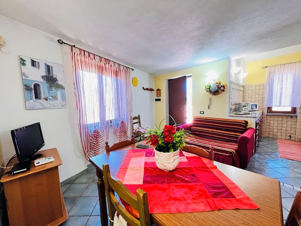 Apartment, 3 Bedrooms | Living area | 22-inch flat-screen TV with digital channels, TV